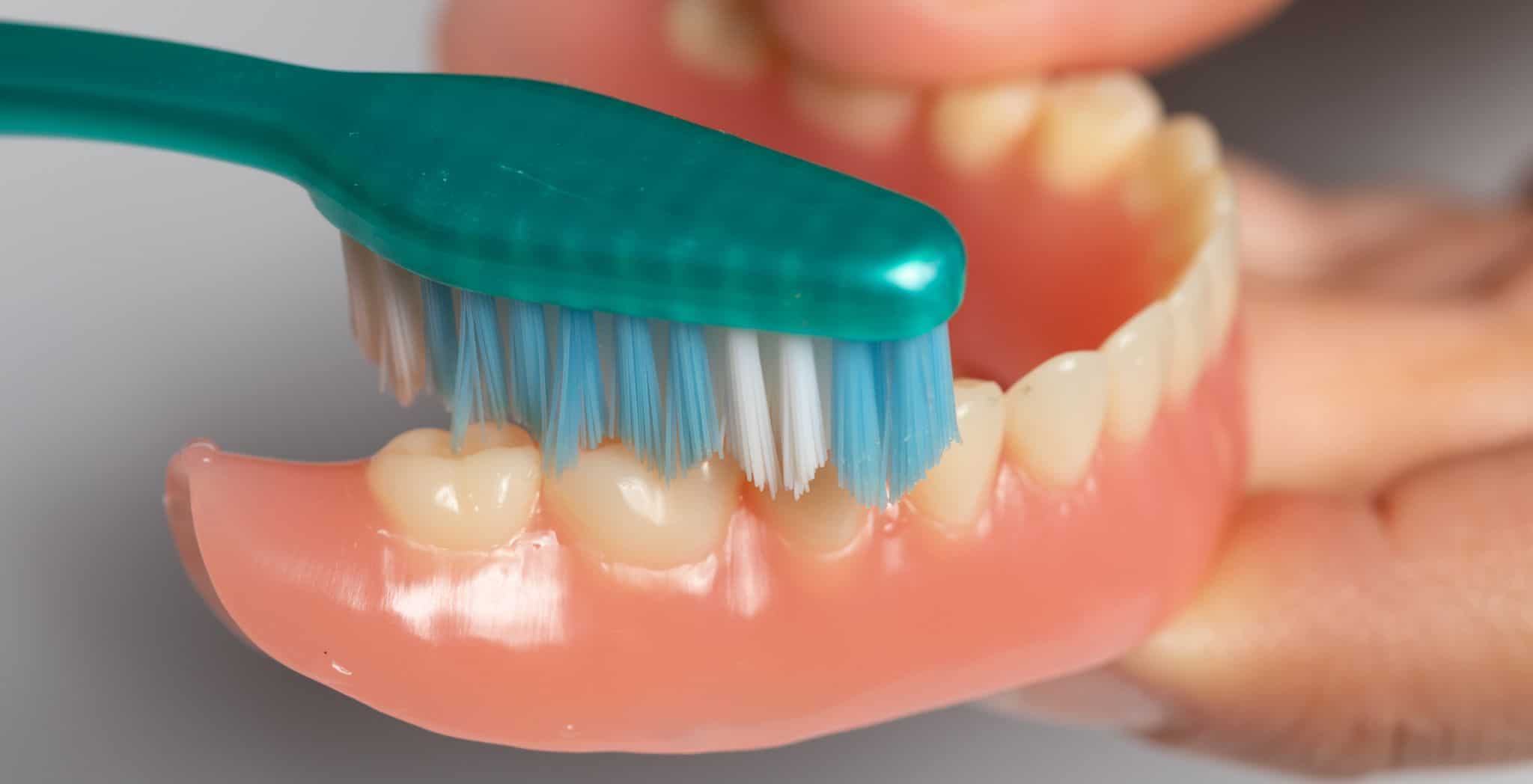 Cleaning dentures, How to clean dentures, Denture cleaning tips, Best way to clean dentures, Denture hygiene routine, Daily denture care, Removing plaque from dentures, Denture brushing techniques